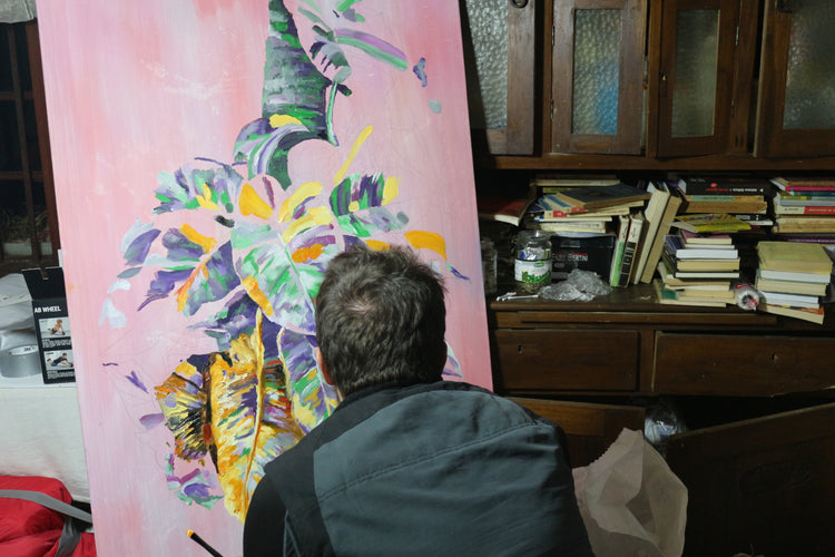 
Dominic Virtosu painting the artwork "Jungle" in the winter between 2018 and 2019 in his country-side studio in Romania.